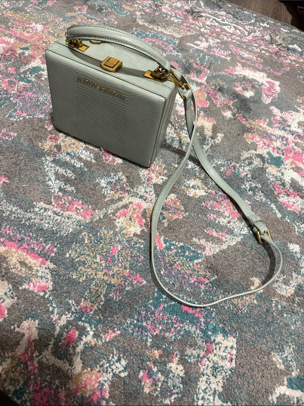 Brandon Blackwood green snakeskin trunk purse